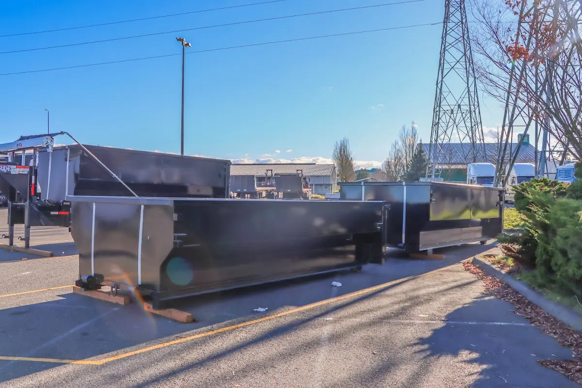 Roll-off dumpster ready for waste disposal at job site for 2 Yard Dumpster Rental in Yeadon